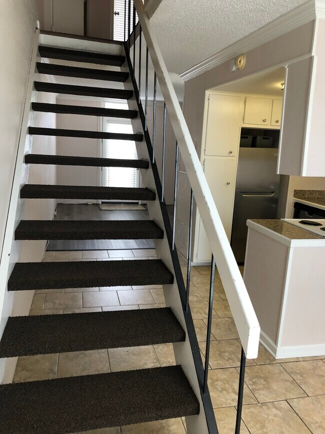 Looking up the stairs - 3005 Highland Rd