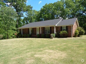 Building Photo - Remodeled Brick Rancher With a Screened Po...