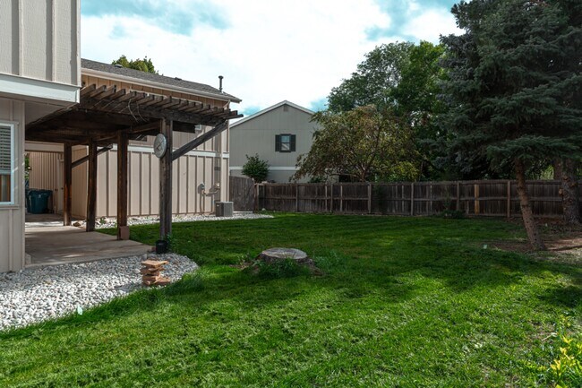 Building Photo - 7355 S Garfield Ct