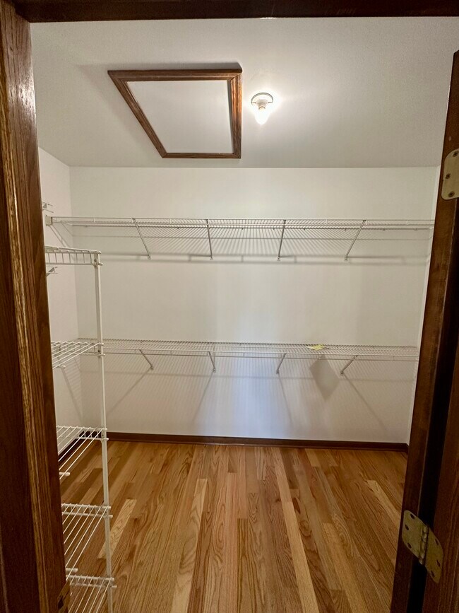 Primary Bedroom Walk-In Closet - 1010 Arbor Ct