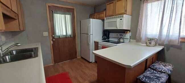 Building Photo - $250.00 Move In Credit!! Cozy Red Cabin in...