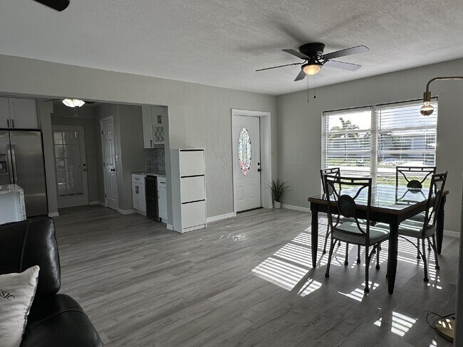 Building Photo - "Elegant 3-Bed Waterfront pool Home"