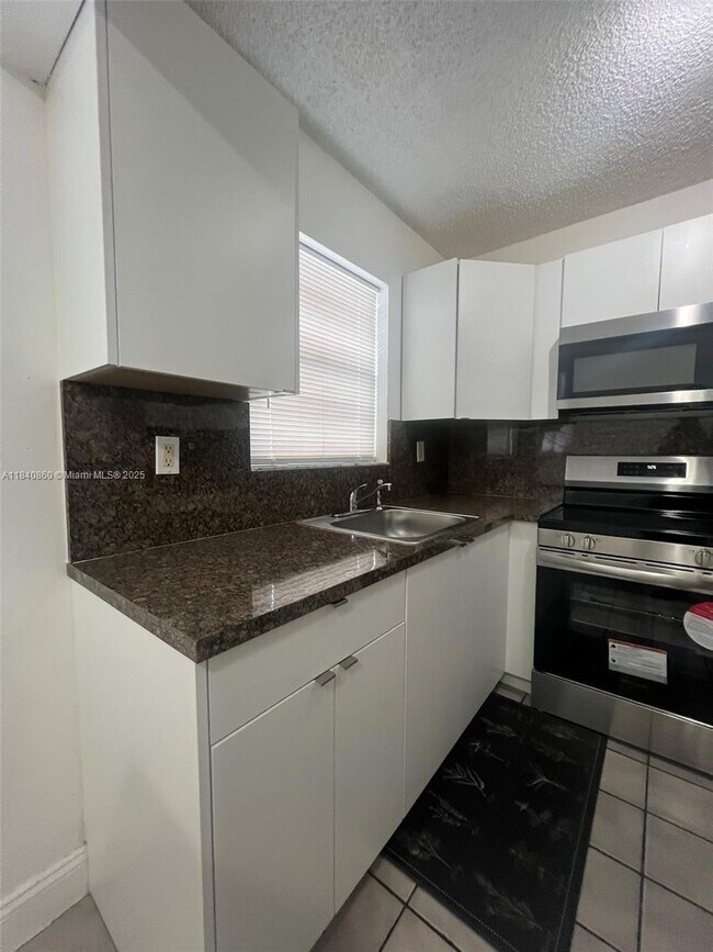 Building Photo - 5935 W 26th Ave