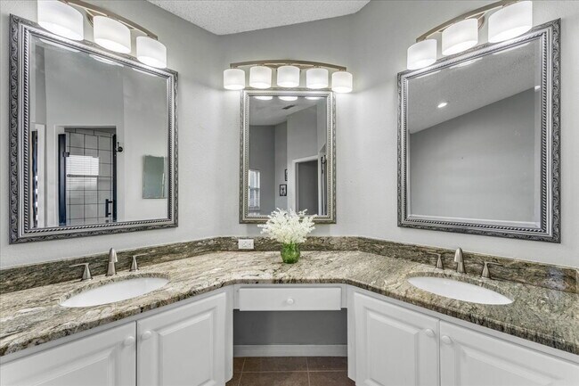 Building Photo - A vibrant 2-bedroom, 2-bathroom tropical retreat designed for both high-energy entertaining and l...