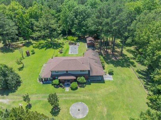 Building Photo - Uniquely breathtaking custom home with in-...