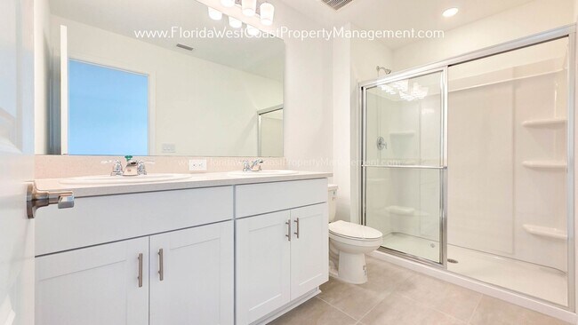 Building Photo - OUTSTANDING BRAND NEW TOWNHOME MOVE IN READY! AZARIO TOWNHOMES LWR !