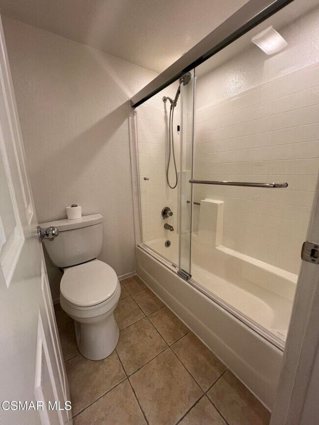 Building Photo - Welcome to this beautifully situated first-floor end unit