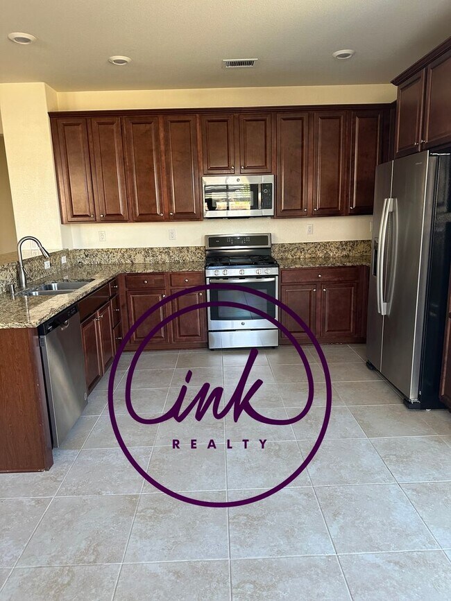 Building Photo - Four Bedroom Single-Family Home