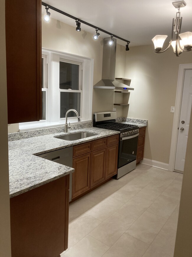 New kitchen with Granite counter - 5632 N Meade Ave