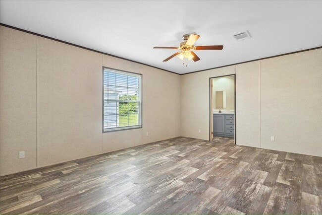 Building Photo - 6680 Hidden Oaks Dr