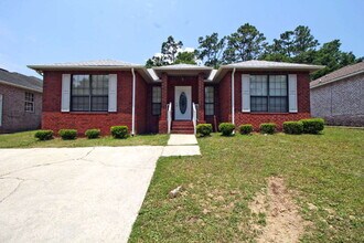 Building Photo - 3BR/2BA North Pensacola Brick Home with Bonus Room, Vaulted Ceilings & Privacy-Fenced Backyard Ne...