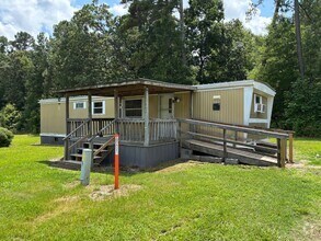 Building Photo - 2 BDRM 1 BA SINGLEWIDE MOBILE HOME IN PARK...