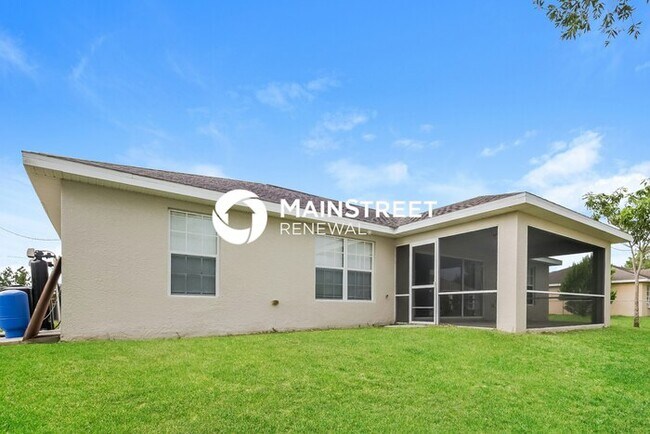 Building Photo - 3 Bedroom Pet-Friendly Home in LEHIGH ACRES, FL with Main Street Renewal