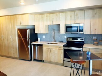 Building Photo - Brooklyn Yard - Stylish, Green Living!
