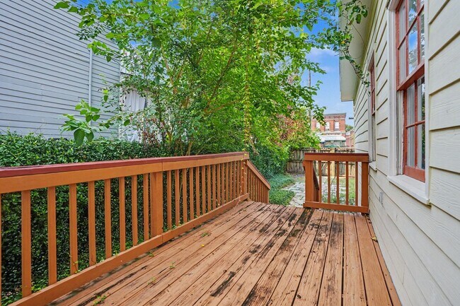 Building Photo - 2 Bedroom Charmer with Sundeck, Wood Floors, and High Ceilings