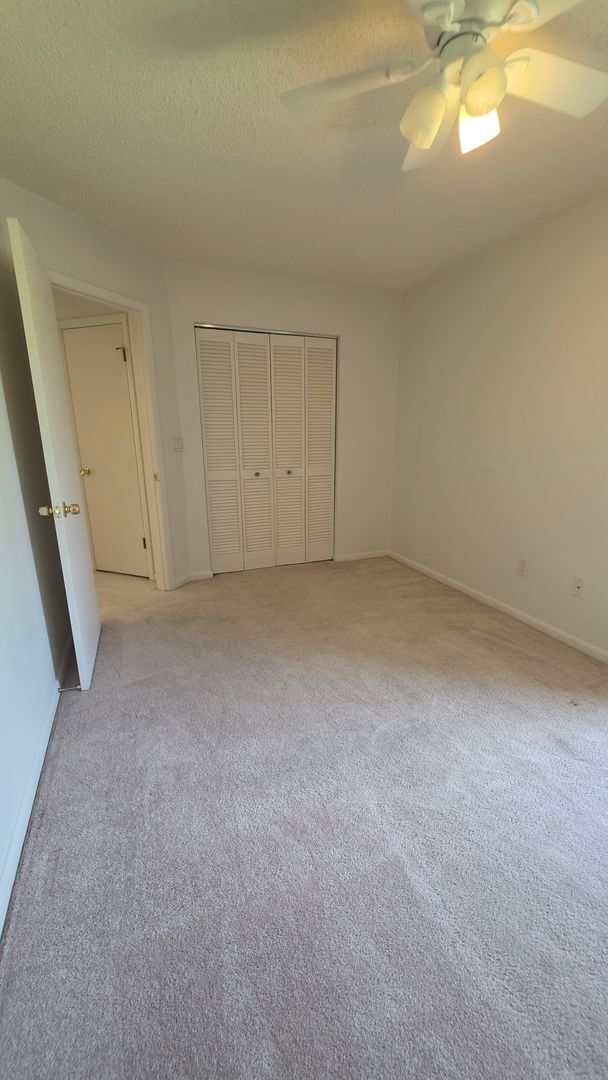 Building Photo - Beautiful Pond Front 2 Bedroom 2 Bath Townhome in the Wood Haven Community
