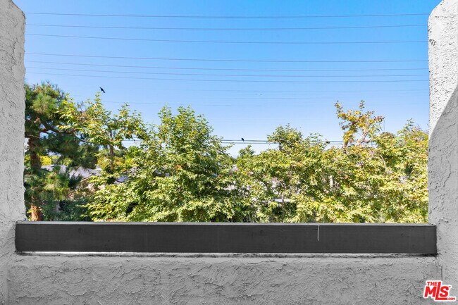 Building Photo - 4900 Overland Ave