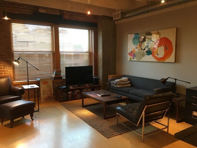 Building Photo - Historic Chown Pella Lofts - east facing studio w/parking/most utilities/rooftop deck