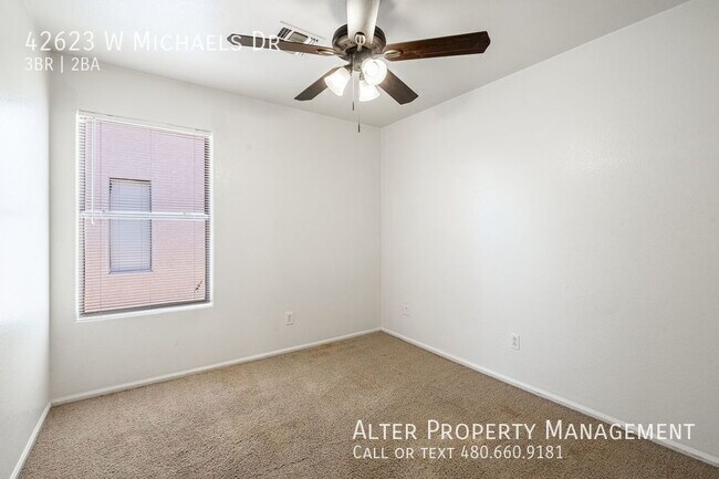 Building Photo - 42623 W Michaels Dr