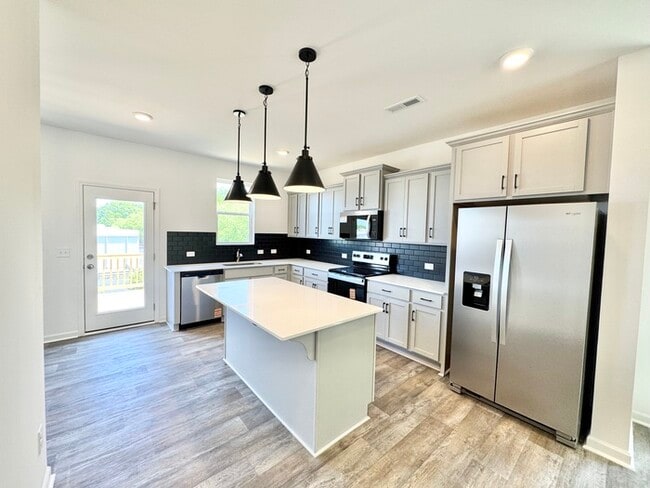 Building Photo - New construction! Three bedroom townhome off Poplar Tent Rd
