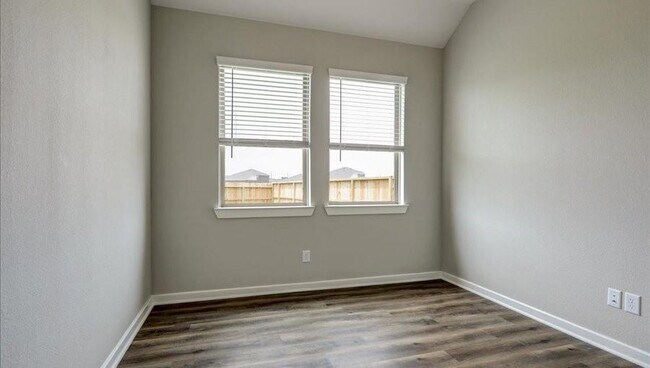 Building Photo - 810 Whispering Winds Dr