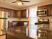 Building Photo - Upgraded 2 Bed/2 Bath plus Den HOME 1100 sq ft. Unit...A Must See!!!