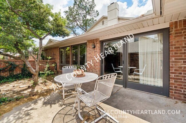 Building Photo - 9009 N May Ave