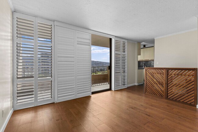 Building Photo - Wake Up to Stunning Mountain & Ala Wai Canal Views in the Heart of Waikiki