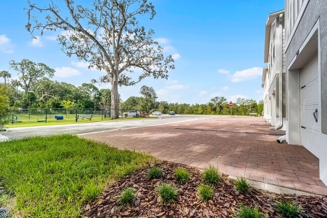 Building Photo - Brand New ~ 3/2.5 End Unit Townhome w/ Sty...