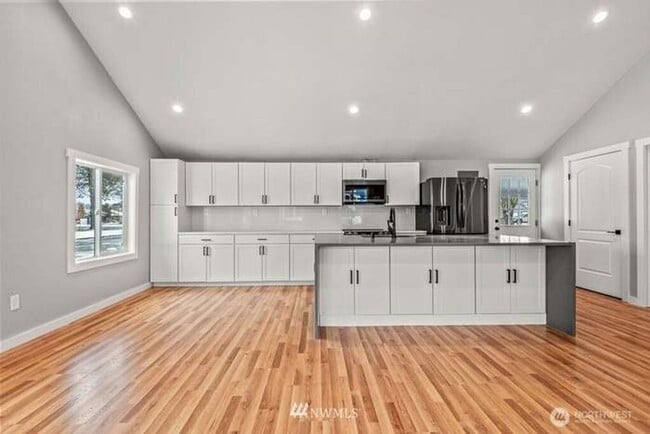 Building Photo - Remodeled open concept home with shop!