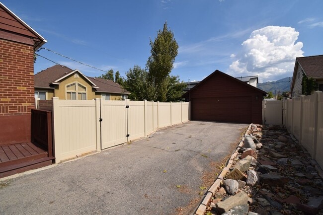 Building Photo - Amazing Home in Millcreek with Backyard Oasis!