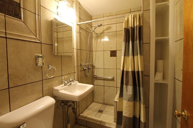 Building Photo - 8244 Woolston Ave