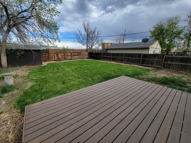 Building Photo - 4-bed, 2-bath home with large back yard
