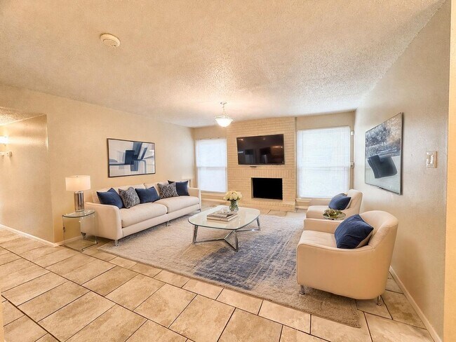 Building Photo - Single-level living on ground floor  |  Fresh paint (July 2026)  |  2 carports  |  Community Pool...