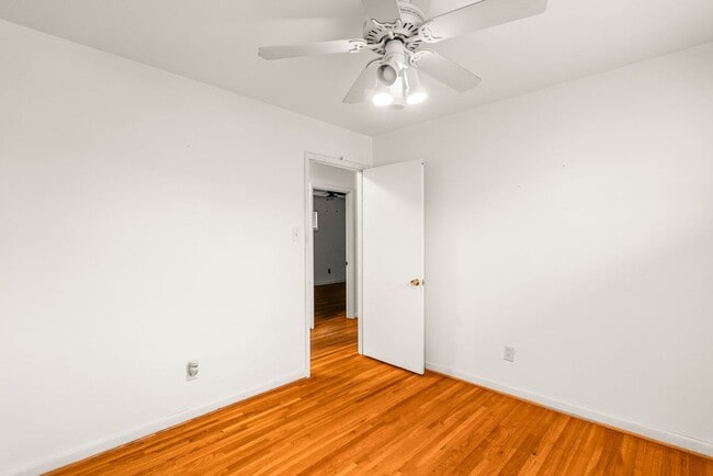 Building Photo - Updated 3BR/2BA Brick Home with Hardwood Floors & Large Yard