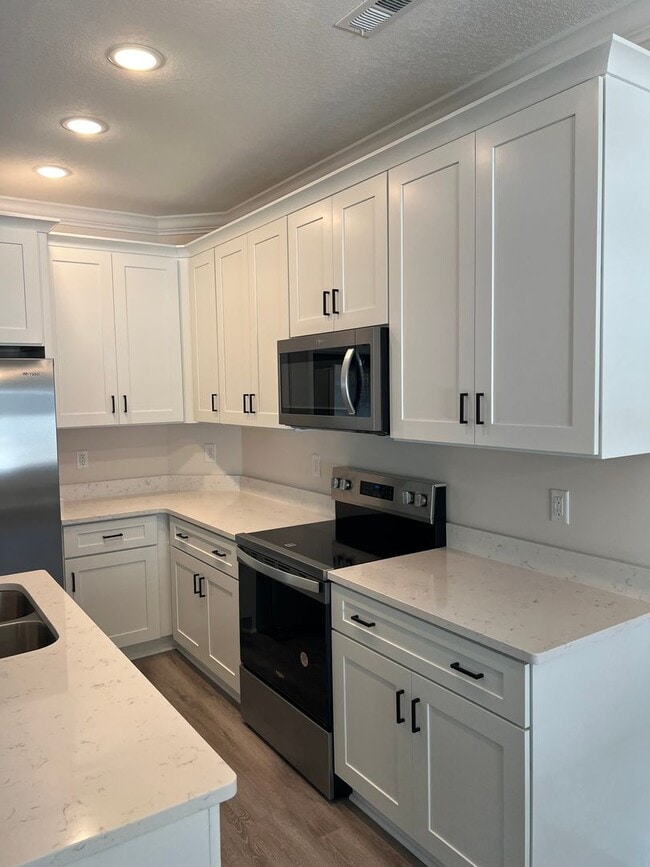 Building Photo - June availability! Brand New! Beautiful Fi...