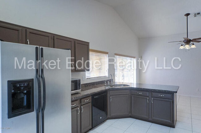 Building Photo - 4Bed/2Bath House at 48th St/Warner! JOIN T...
