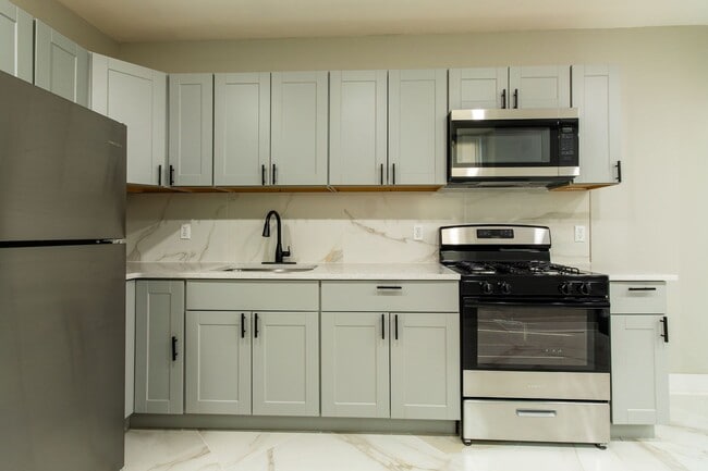 Building Photo - Spacious 3-Bedroom Single-Family Row Home ...