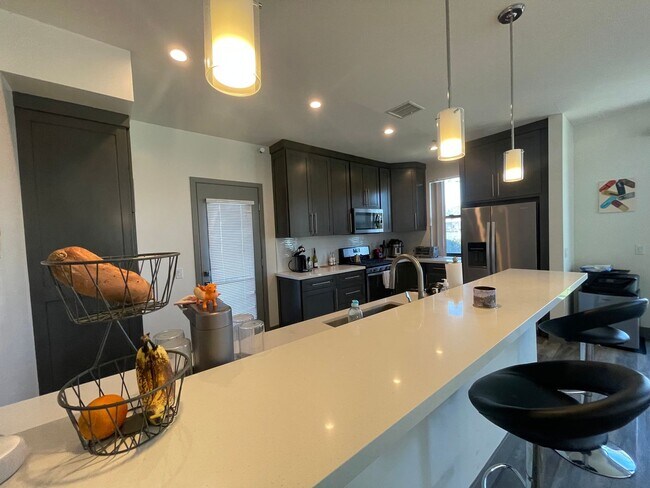 Building Photo - NEWER  4BED 3 BATH FRONT TOWNHOME*HWFLS*BALCONY*W/D IN  UNIT* CENTRAL AIR/HEAT* *STAINLESS  APPLI...