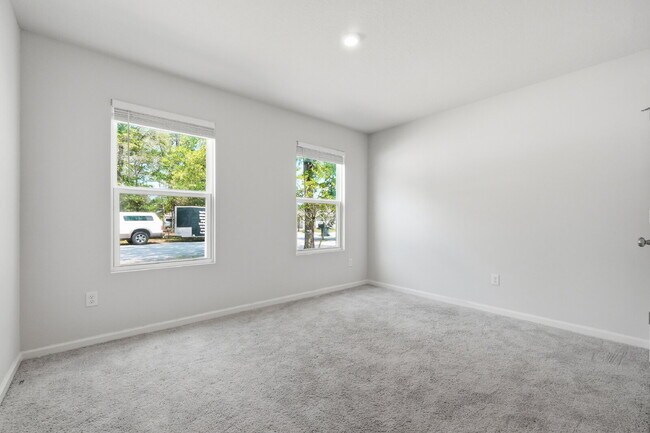 Building Photo - New community! Three bedrooms, two bathrooms and ready for you to move into!