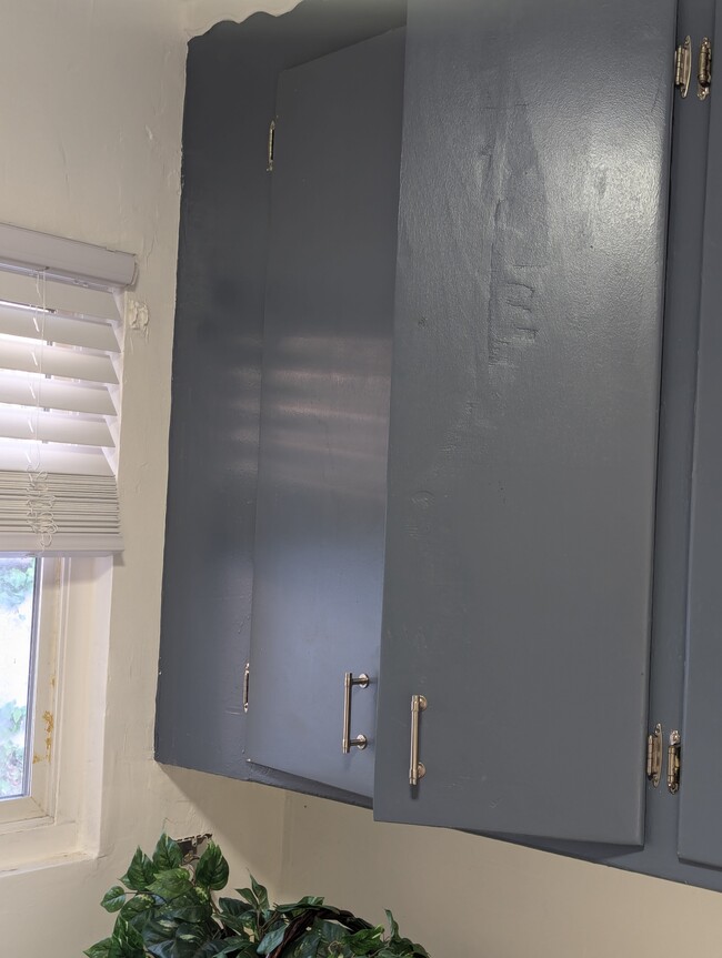 Refreshed kitchen cabinets with one-year old fridge - 9512 Hillside St