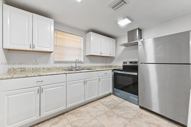 Building Photo - 10789 N Military Trl