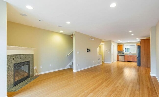 Building Photo - Energy-efficient townhome in the desirable community of Crown Hill is ready to be loved!