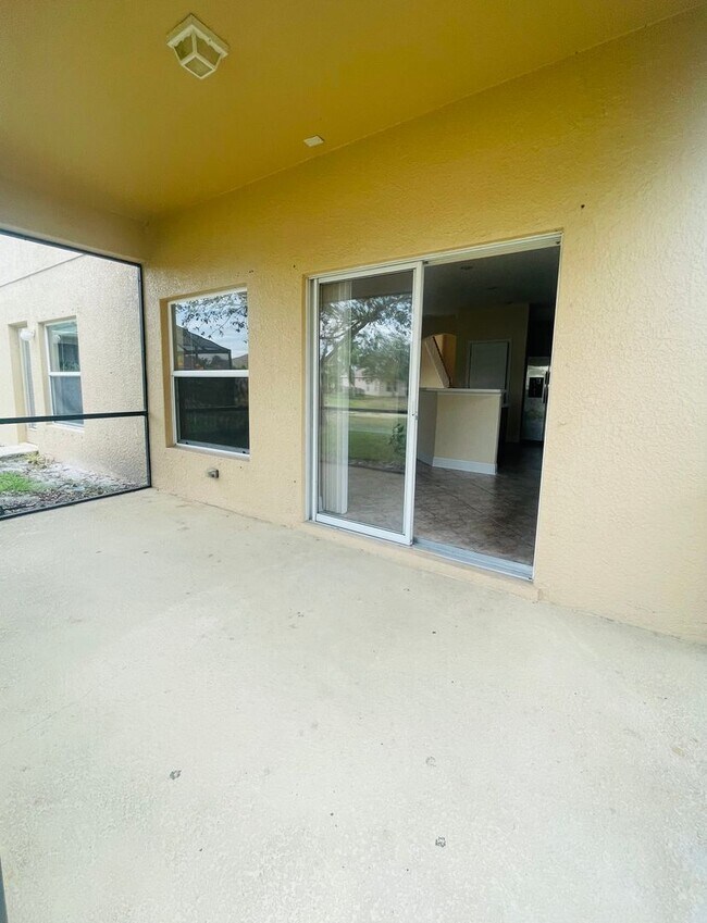 Building Photo - **SUNCOAST LAKES GATED COMMUNITY**