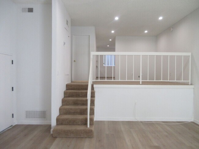 Building Photo - Duggan Property Management, Inc presents  *Reduced*  Canoga Park- 3BD 2.5BA