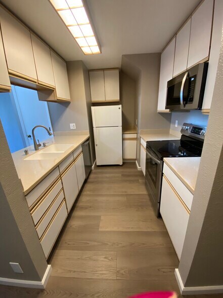 Chef’s kitchen with new range/oven, microwave, dishwasher - 443 Willow Ave