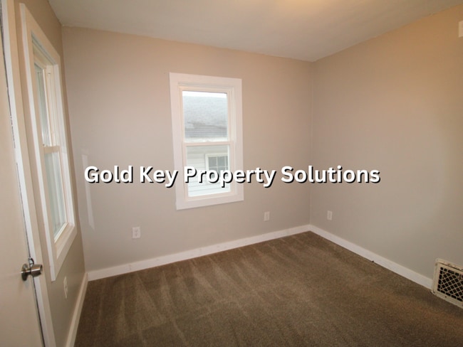 Building Photo - Attractive 2 BR 1 BA House with 2-Car Garage and Covered Porch (NO SECTION 8)