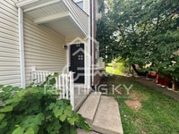 Building Photo - Updated 2-Bed, 1.5-Bath Townhome with a Ga...