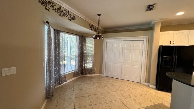 Building Photo - Spacious 4/3.5 Pool Home with Water View & 3-Car Garage in Lee Vista Area (close to Lake Nona)