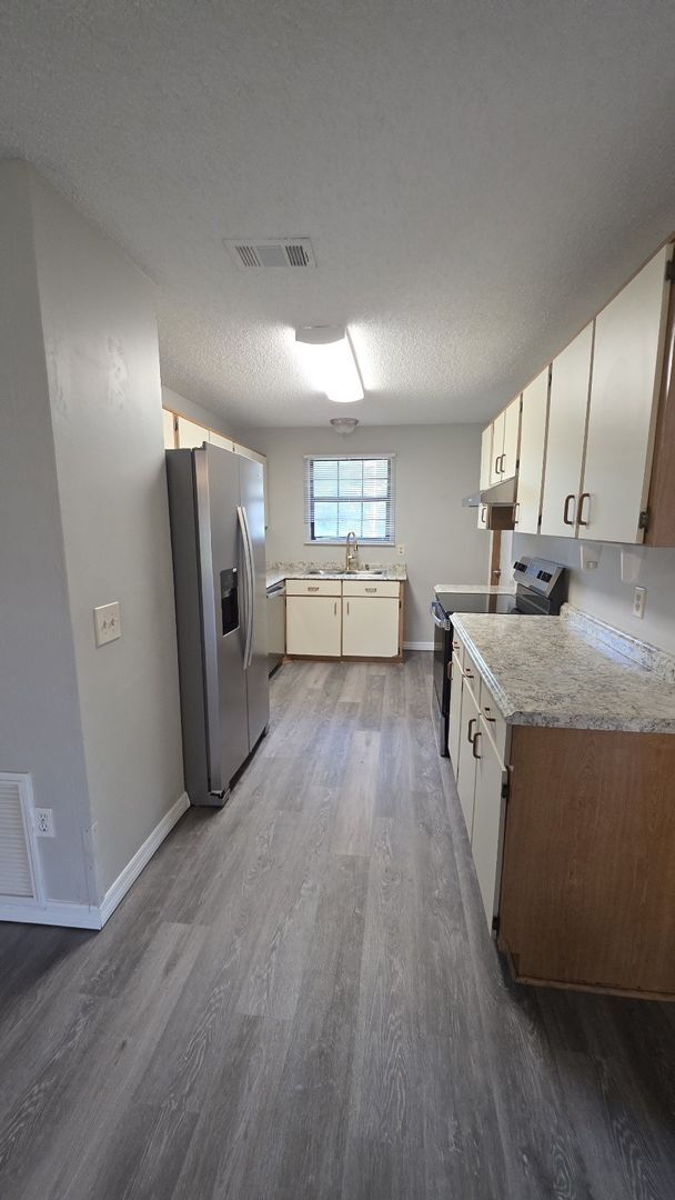 Building Photo - Palm Coast 4 Bedroom 2 Bath in the W Section